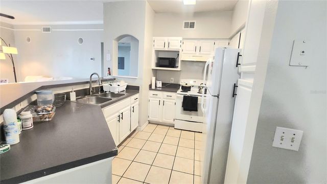 6413 ASTOR VILLAGE AVENUE 216, Orlando, FL 32835