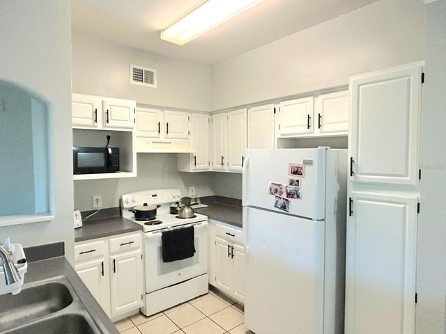 6413 ASTOR VILLAGE AVENUE 216, Orlando, FL 32835