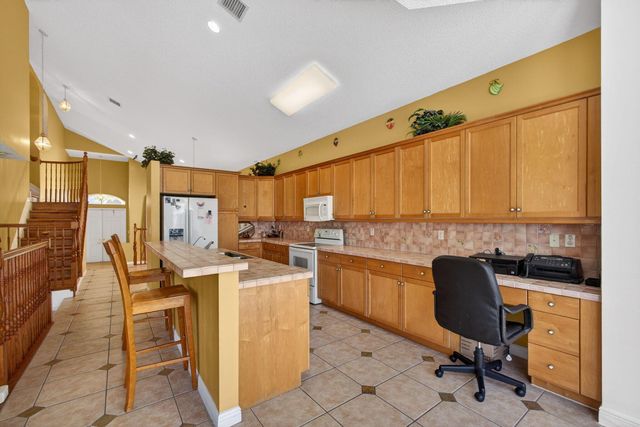 2008 Reston Circle, Royal Palm Beach, FL 33411