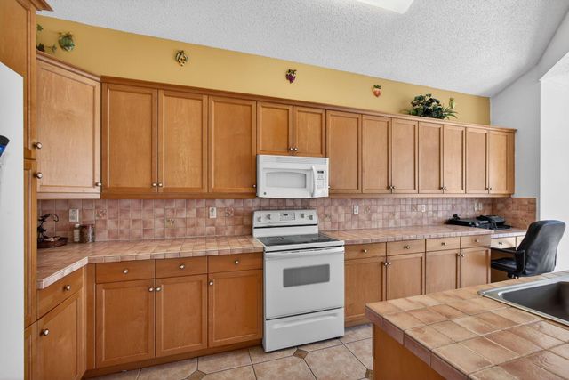 2008 Reston Circle, Royal Palm Beach, FL 33411