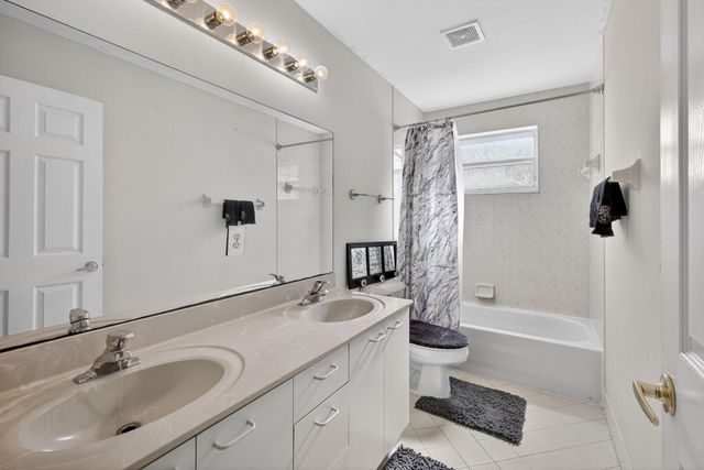 2008 Reston Circle, Royal Palm Beach, FL 33411