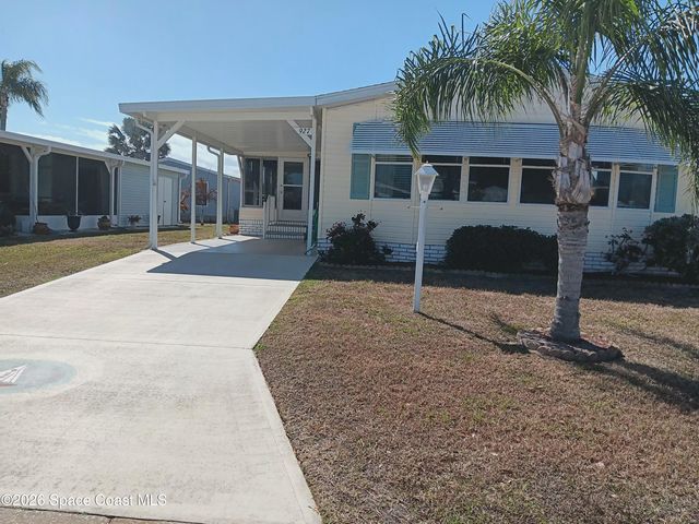 927 Dogwood Drive, Barefoot Bay, FL 32976