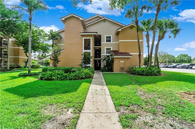 8821 Wiles Road 101, Coral Springs, FL 33067