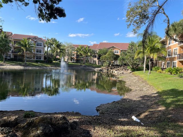 8821 Wiles Road 101, Coral Springs, FL 33067