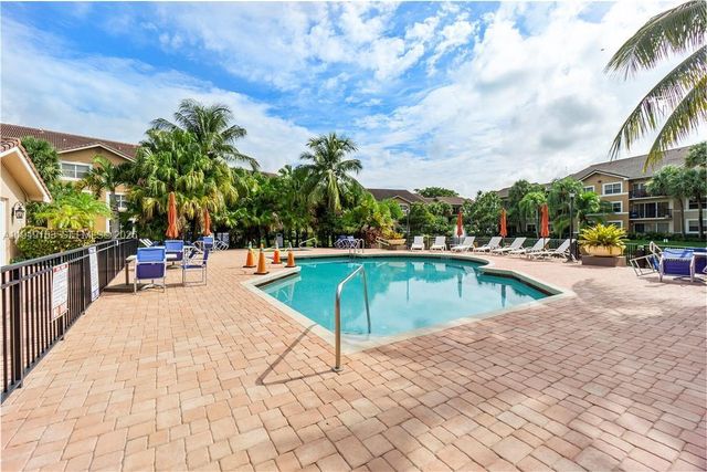 8821 Wiles Road 101, Coral Springs, FL 33067