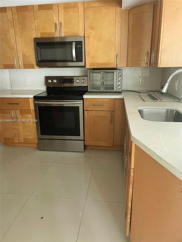 8821 Wiles Road 101, Coral Springs, FL 33067