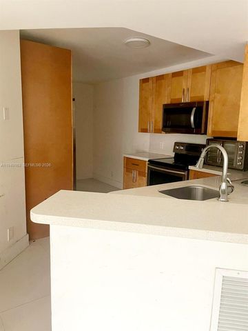 8821 Wiles Road 101, Coral Springs, FL 33067