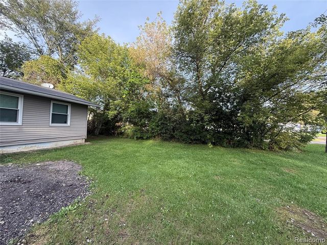 5489 Avis Drive, Burton, MI 48519