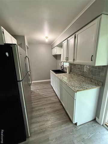 5489 Avis Drive, Burton, MI 48519