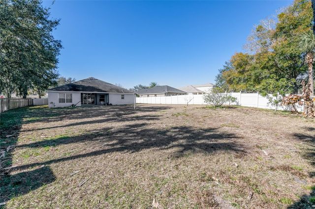 1128 HELMSDALE DRIVE, Wesley Chapel, FL 33543