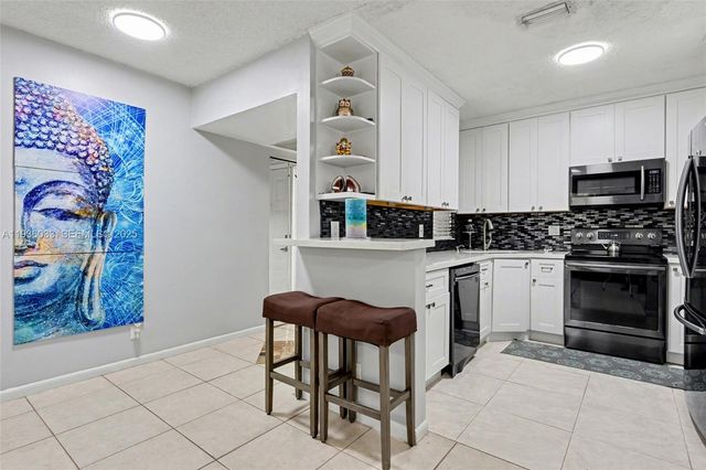 4534 S Carambola Circle S 27275, Coconut Creek, FL 33066