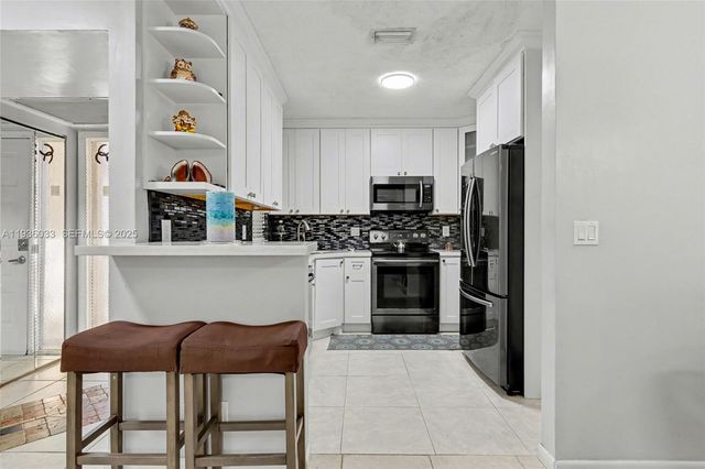 4534 S Carambola Circle S 27275, Coconut Creek, FL 33066
