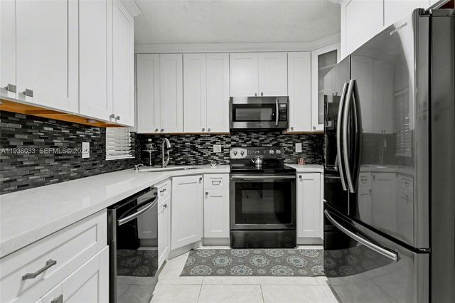 4534 S Carambola Circle S 27275, Coconut Creek, FL 33066