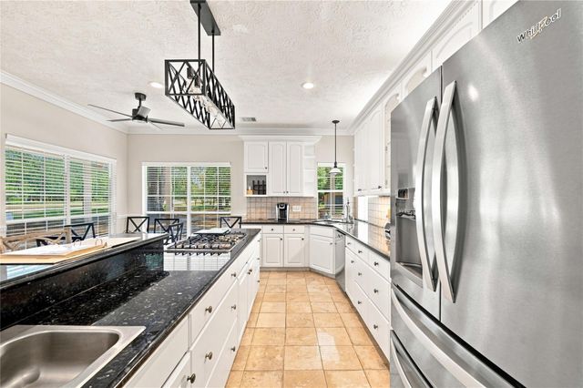 29019 Misty Oaks Drive, Huffman, TX 77336