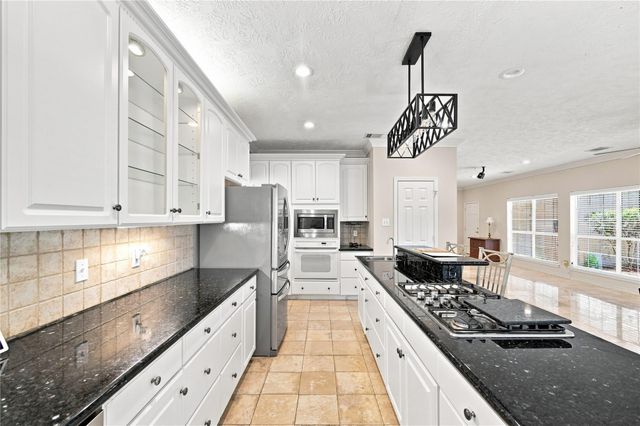 29019 Misty Oaks Drive, Huffman, TX 77336