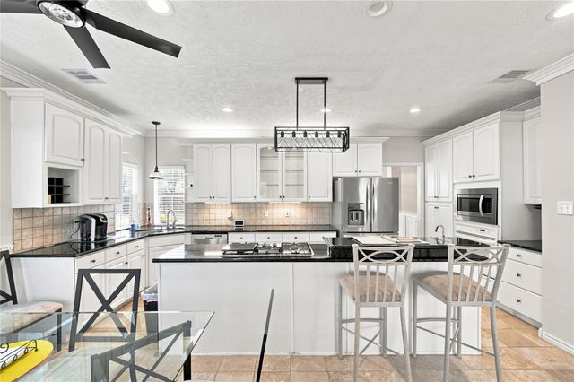 29019 Misty Oaks Drive, Huffman, TX 77336