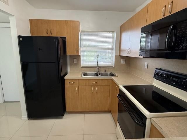 9660 Sunrise Lakes Boulevard 306, Sunrise, FL 33322