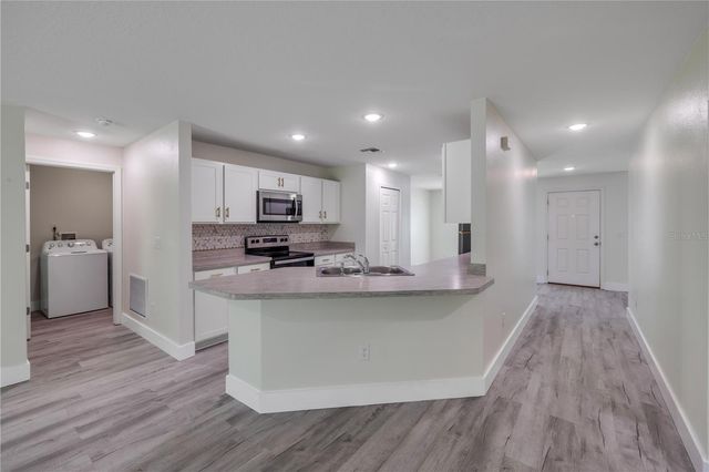 176 PINE GROVE DRIVE, Palm Coast, FL 32164