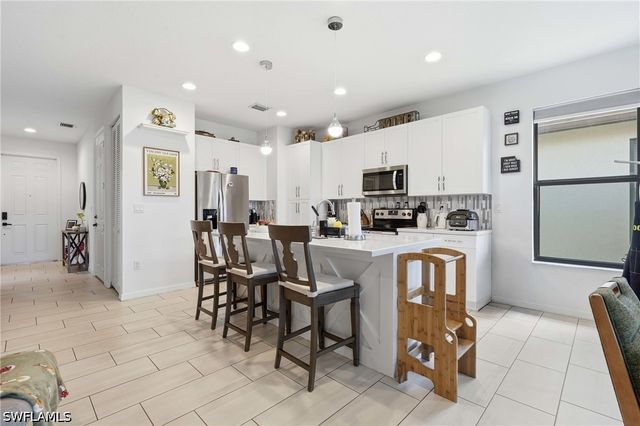 8932 Madrid CIR, Naples, FL 34104