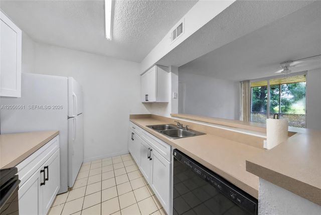 4025 W Mcnab Road E107, Pompano Beach, FL 33069