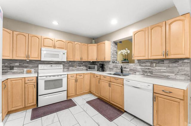 305 Henthorne Drive, Palm Springs, FL 33461