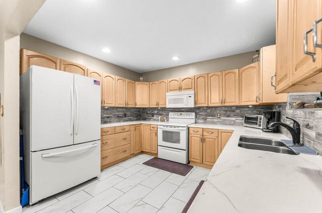 305 Henthorne Drive, Palm Springs, FL 33461