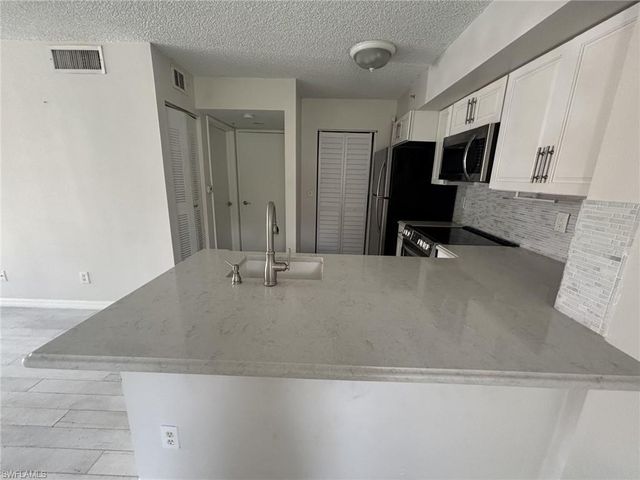 1260 Wildwood Lakes BLVD 107, Naples, FL 34104