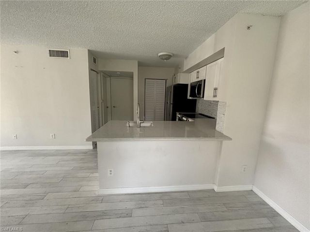 1260 Wildwood Lakes BLVD 107, Naples, FL 34104