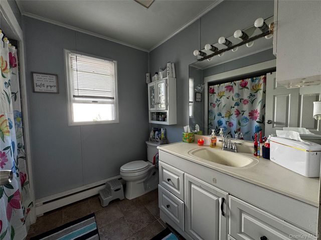 16 Beach Avenue, Copiague, NY 11726