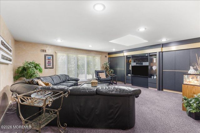 16 Leonard Drive, Morganville, NJ 07751
