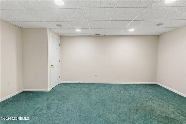 16 Leonard Drive, Morganville, NJ 07751
