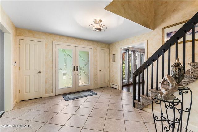 16 Leonard Drive, Morganville, NJ 07751