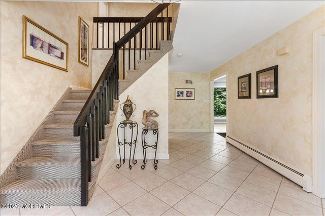 16 Leonard Drive, Morganville, NJ 07751