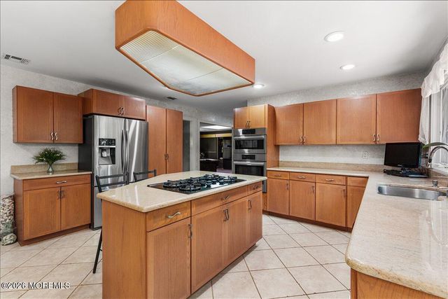 16 Leonard Drive, Morganville, NJ 07751