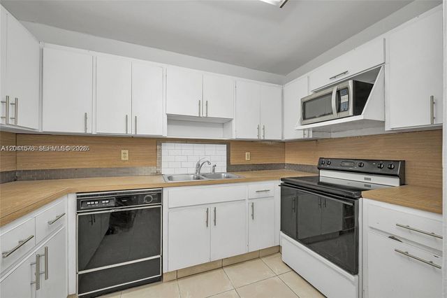 5050 NW 7th St 202, Miami, FL 33126