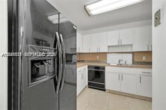 5050 NW 7th St 202, Miami, FL 33126