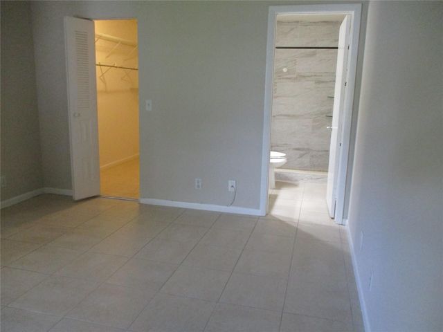22053 PALMS Way 203, Boca Raton, FL 33433