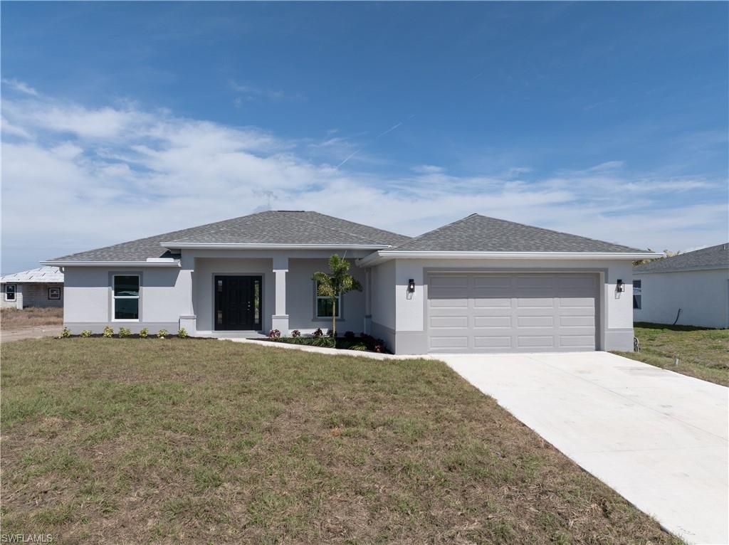 Image 1 of property listing at 1027 NW 19th ST, Cape Coral, FL 33993