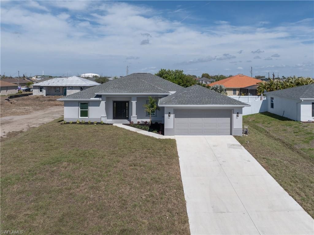 Image 2 of property listing at 1027 NW 19th ST, Cape Coral, FL 33993