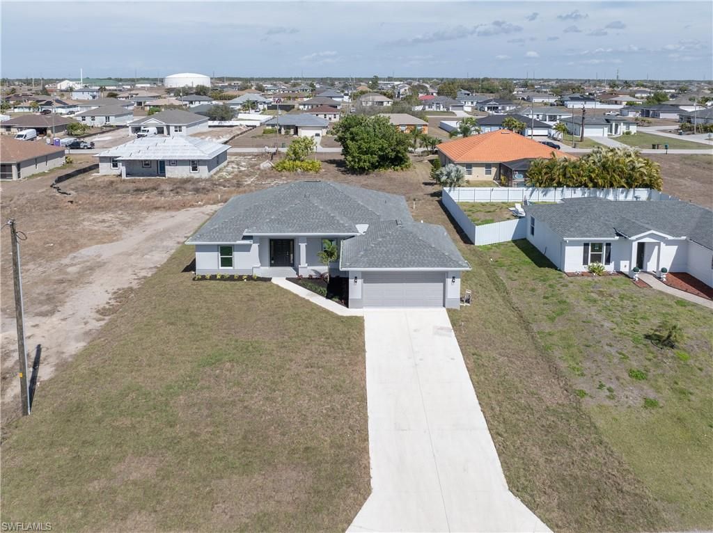 Image 3 of property listing at 1027 NW 19th ST, Cape Coral, FL 33993