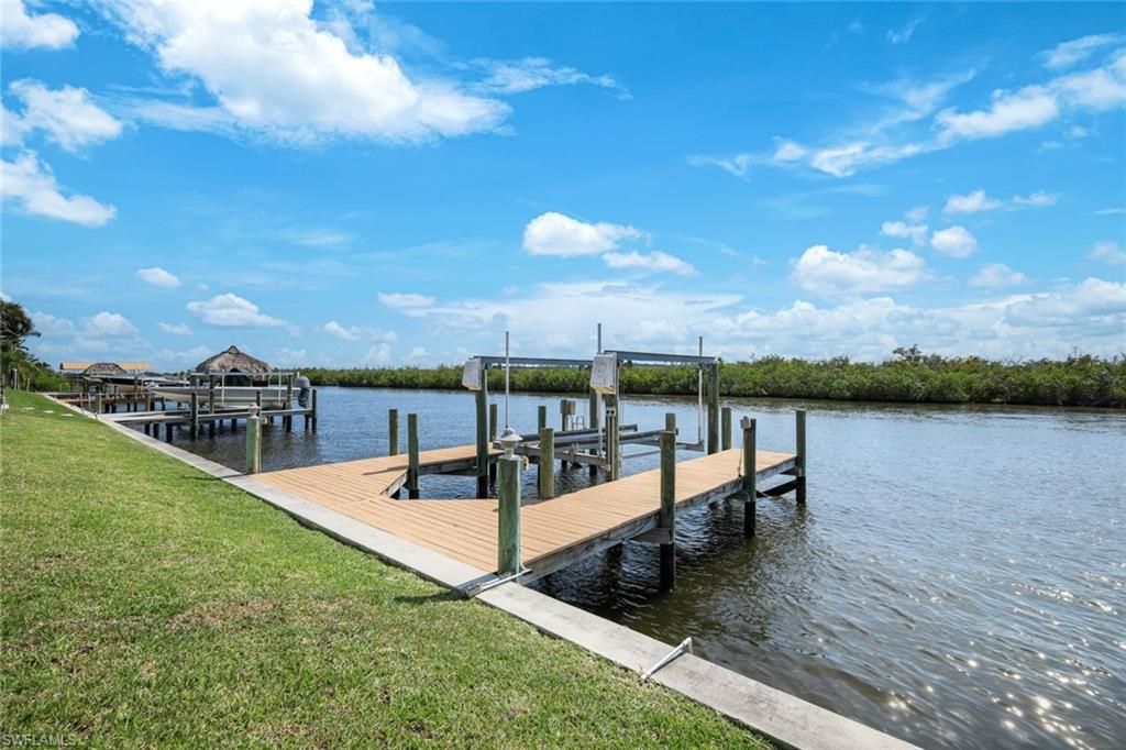 Image 7 of property listing at 1128 NW 43rd AVE, Cape Coral, FL 33993