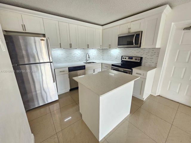 1105 Green Pine Boulevard E3, West Palm Beach, FL 33409