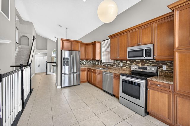1204 OAKWATER Drive, Royal Palm Beach, FL 33411