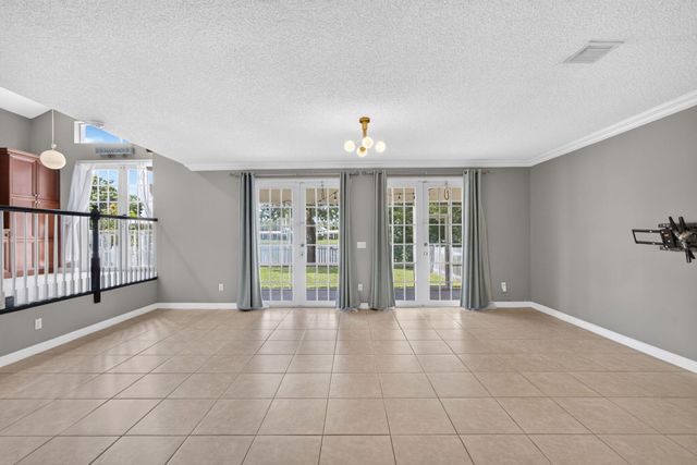 1204 OAKWATER Drive, Royal Palm Beach, FL 33411