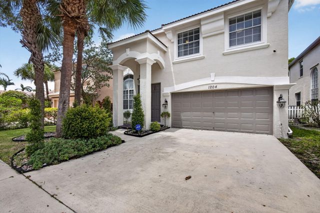 1204 OAKWATER Drive, Royal Palm Beach, FL 33411