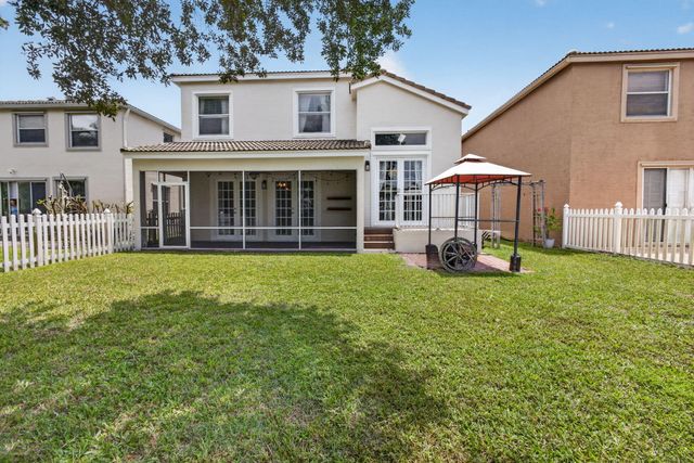 1204 OAKWATER Drive, Royal Palm Beach, FL 33411