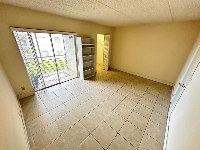 600 Village Green Court 203, Palm Springs, FL 33461