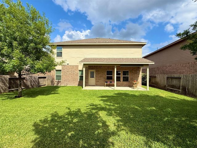 150 Meadow Grove Drive, Conroe, TX 77384