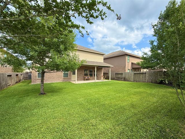 150 Meadow Grove Drive, Conroe, TX 77384