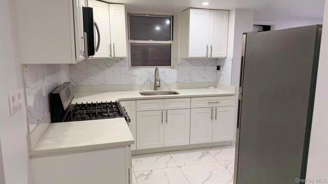 70-51 45th Avenue, Woodside, NY 11377